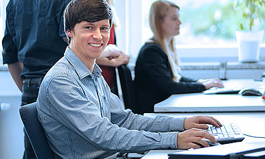 Dual student at a computer